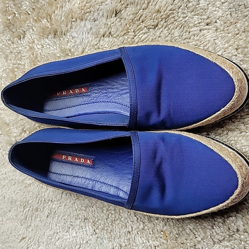 Prada slip on Espadrilles,great used condition shows on Soles, no flaws overall.